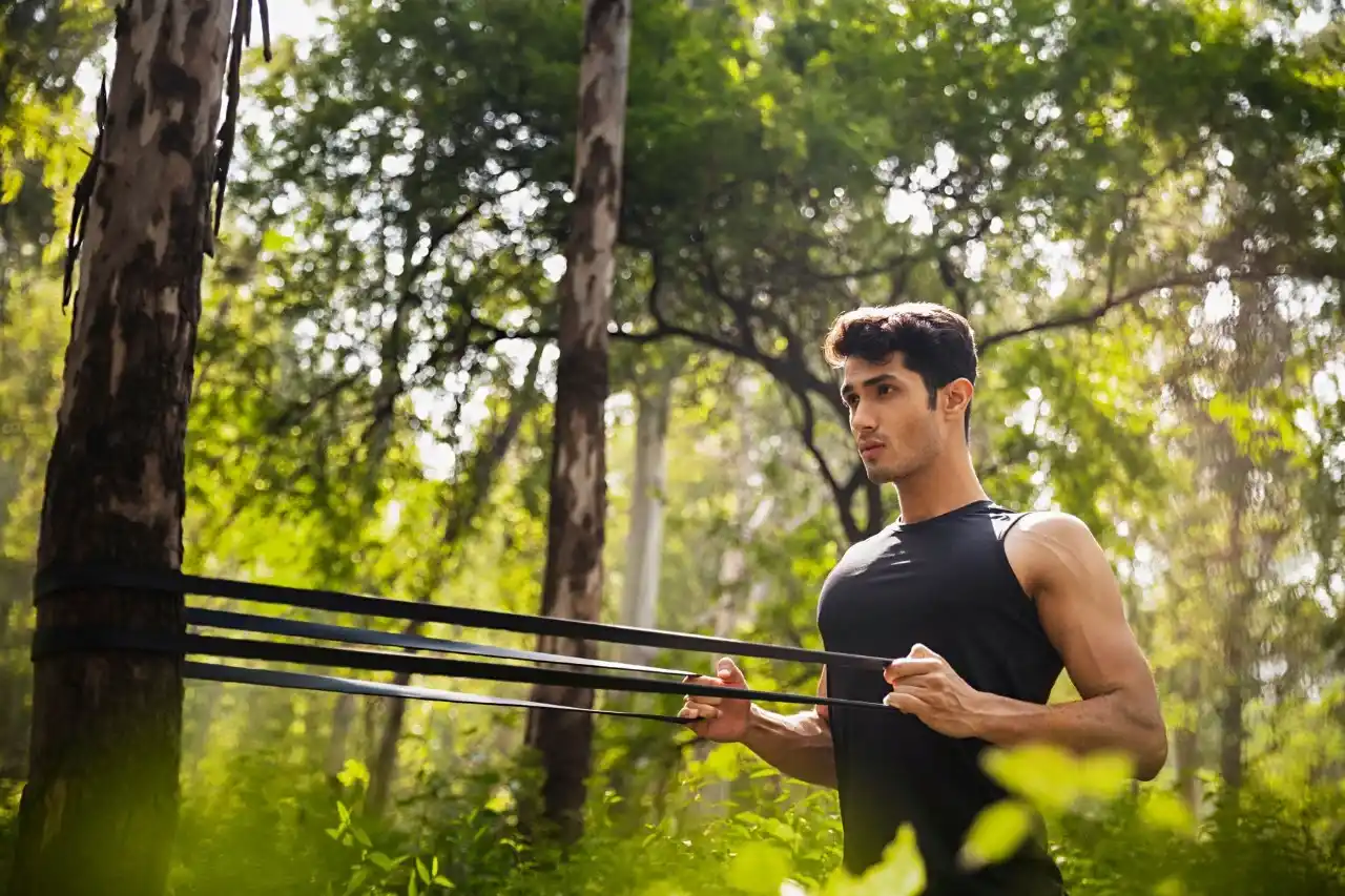 image of man doing workout with resistance band