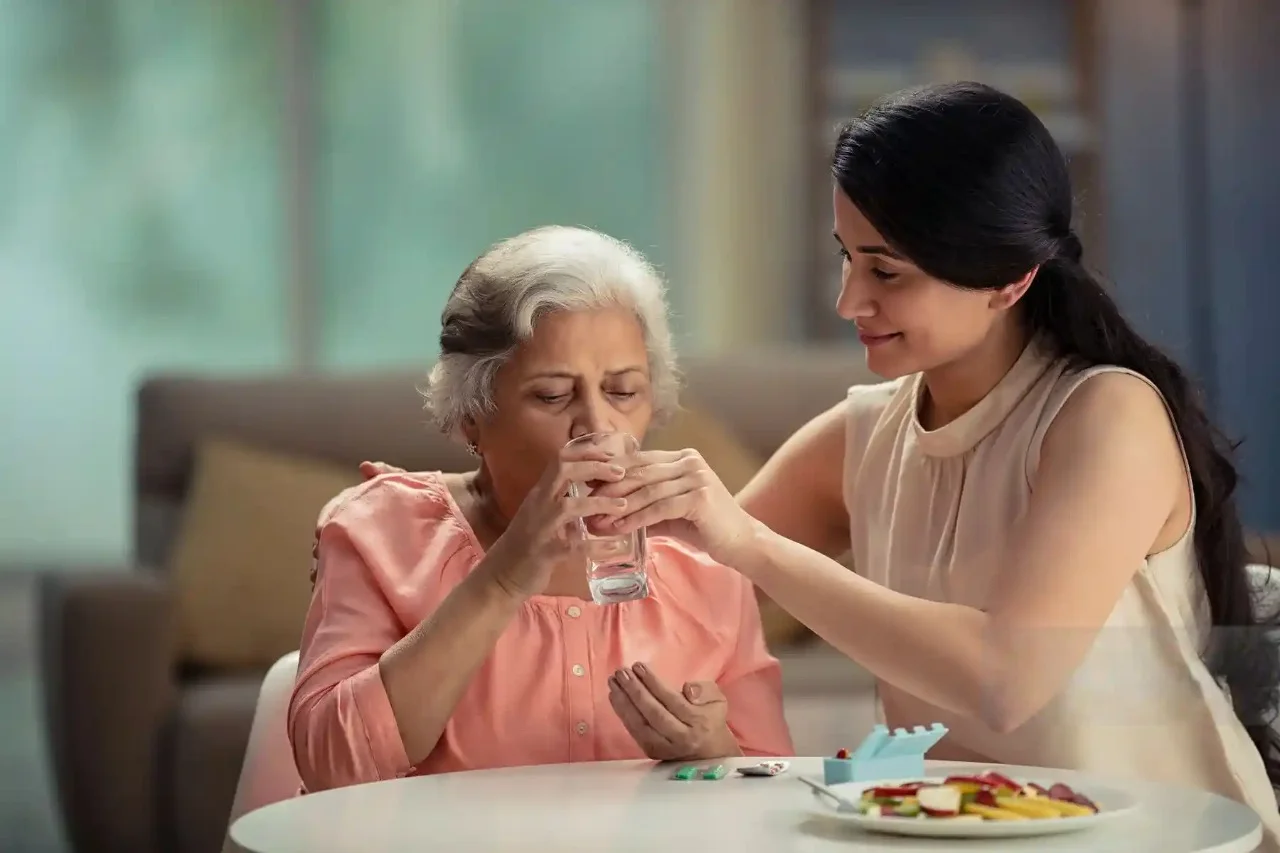 image of old women drinking water